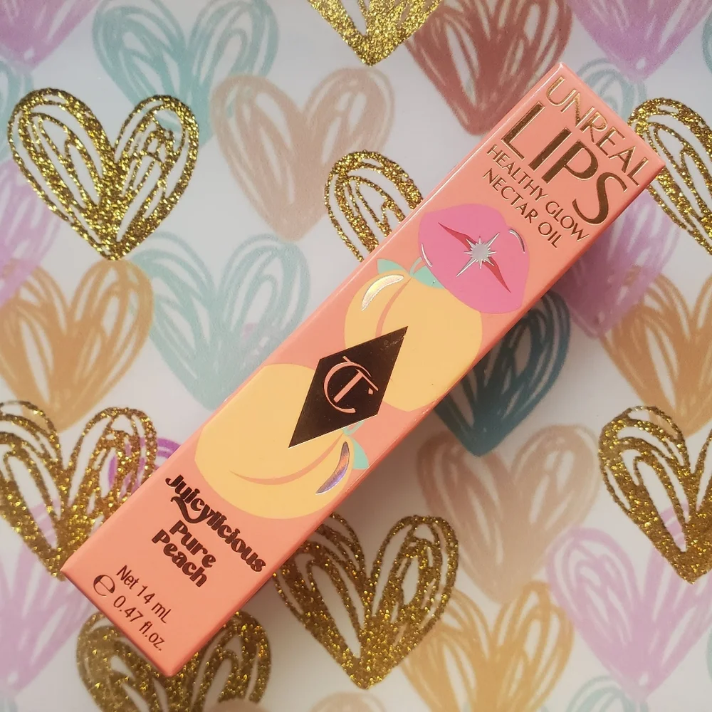 Charlotte Tilbury Pure Peach Tinted Lip Oil- Peach Scent & Color!
